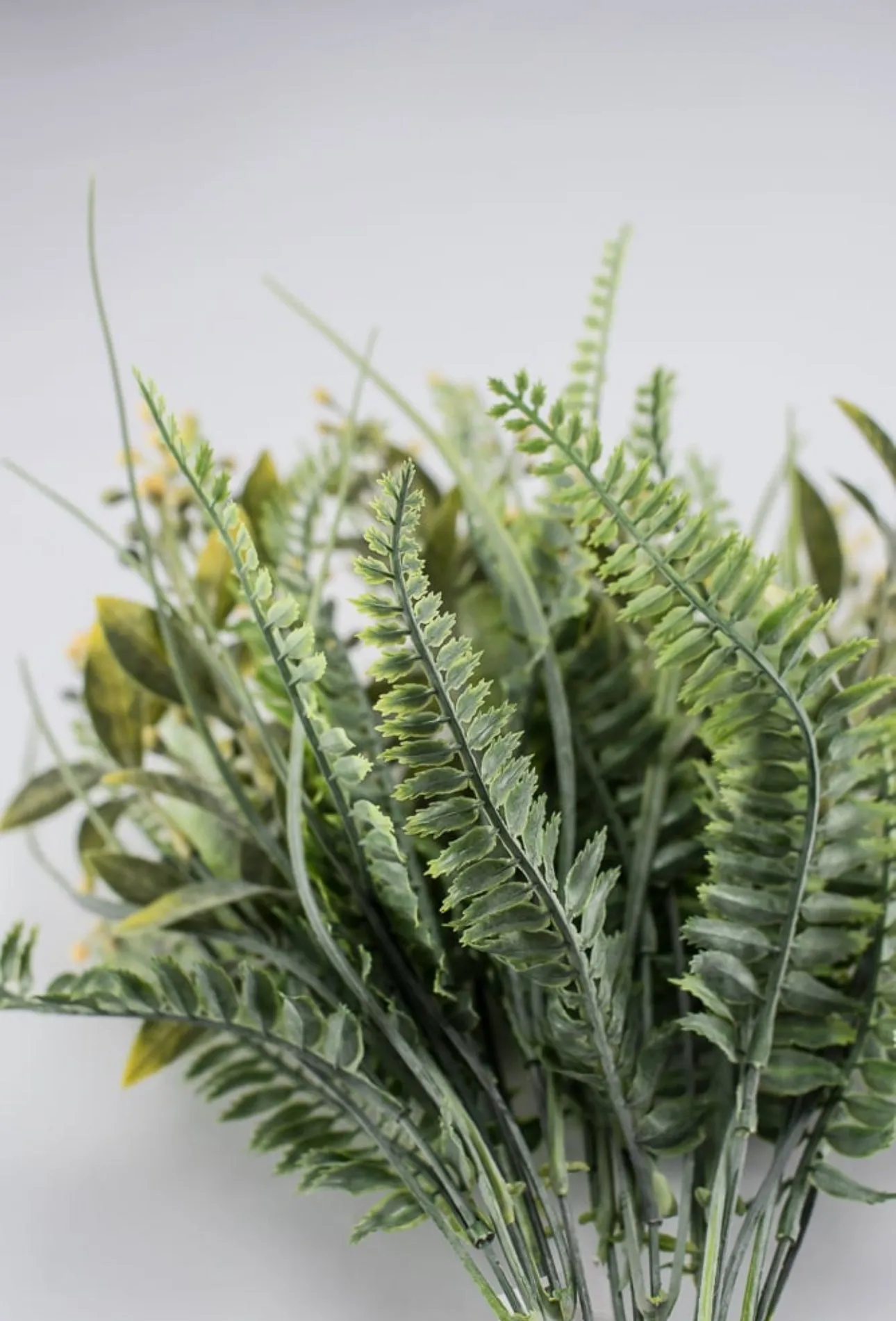 Artificial mixed greenery bush with yellow tips